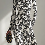 Nikita - Black And White Patterned Stretch Blend Wrap Dress